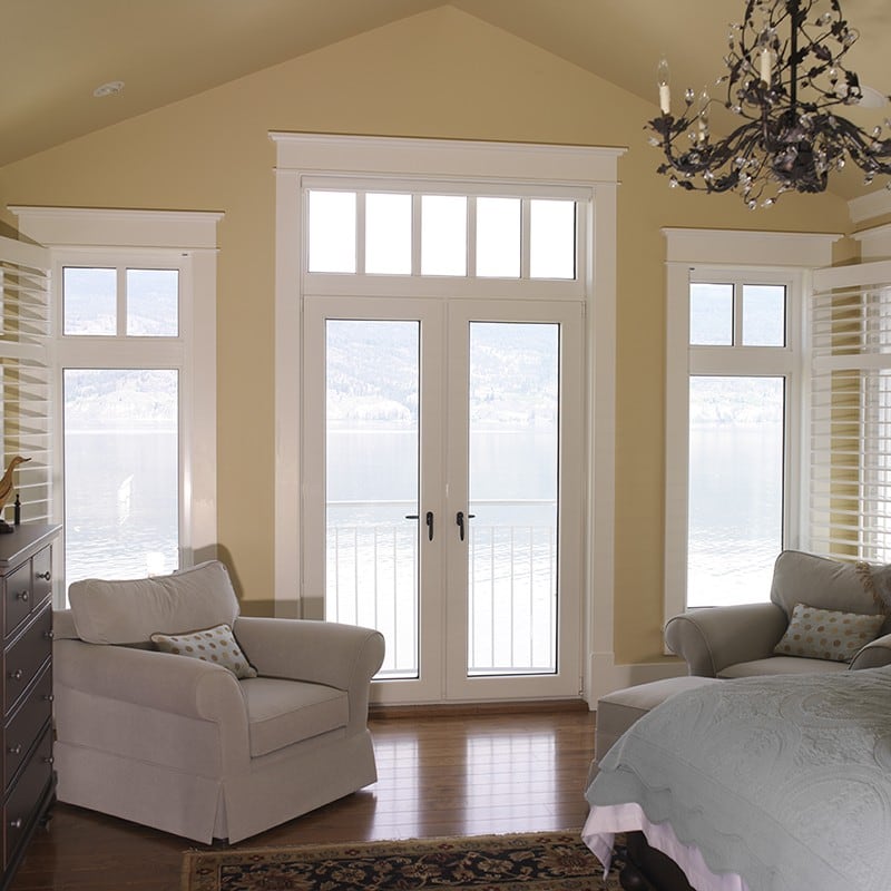 White-trimmed windows in the bright sun.