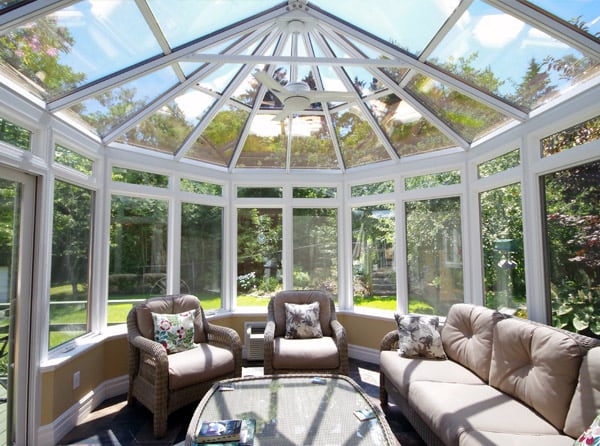Home Conservatory Design with Glass Roof and Aluminum Interior